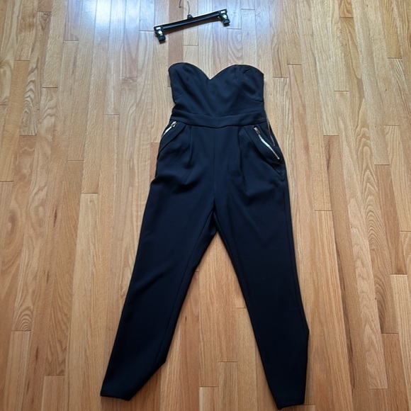 Elliatt black jumpsuit with gold zippers - Picture 4 of 6